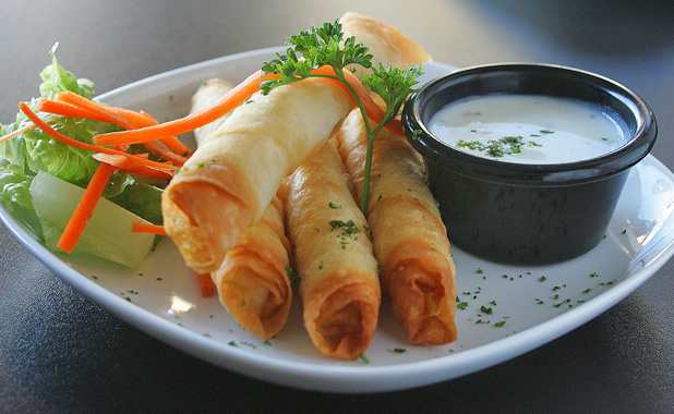 Cheese and herb filled pastry roll